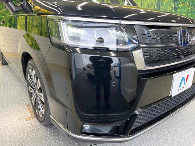 ステップワゴン ｅ：ＨＥＶスパーダ　プレミアムライン　ホンダセンシング　１１型コネクトディスプレイ　フリップダウンモニター　マルチビューカメラ　パワーバックドア　前席／２列目シートヒーター　ブラインドスポットモニター　レーダークルーズ　両側電動ドア（24枚目）