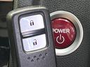 フィットハイブリッド Lパッケージ 純正ナビ バックカメラ 禁煙車 衝突軽減装置 クルーズコントロール LEDヘッド オートライト スマートキー 電動格納ミラー オートエアコン ドラレコ 純正革巻きステアリング ドアバイザー(7枚目)