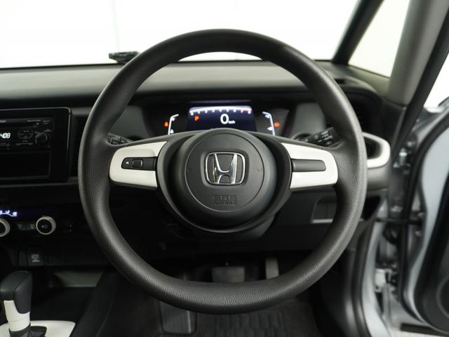 フィット ベーシック 純正CDチューナー/ETC車載器/スマートキー/盗難防止装置/横滑り制御装置/両席SRSエアバッグ/ABS/電動格納式ドアミラー/チップアップシート/パワーウインドウ/サイド&サイドカーテンエアバッグ(6枚目)