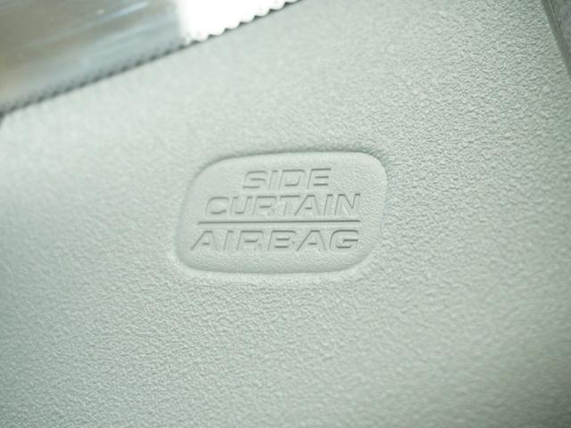 フィット ベーシック 純正CDチューナー/ETC車載器/スマートキー/盗難防止装置/横滑り制御装置/両席SRSエアバッグ/ABS/電動格納式ドアミラー/チップアップシート/パワーウインドウ/サイド&サイドカーテンエアバッグ(9枚目)