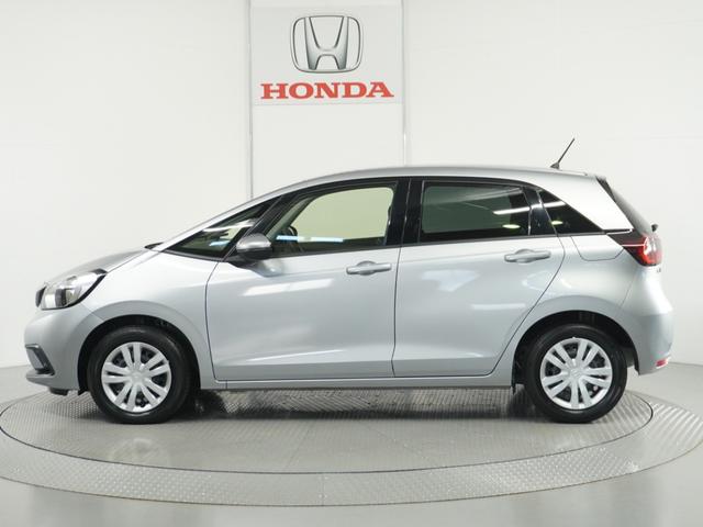 フィット ベーシック 純正CDチューナー/ETC車載器/スマートキー/盗難防止装置/横滑り制御装置/両席SRSエアバッグ/ABS/電動格納式ドアミラー/チップアップシート/パワーウインドウ/サイド&サイドカーテンエアバッグ(12枚目)