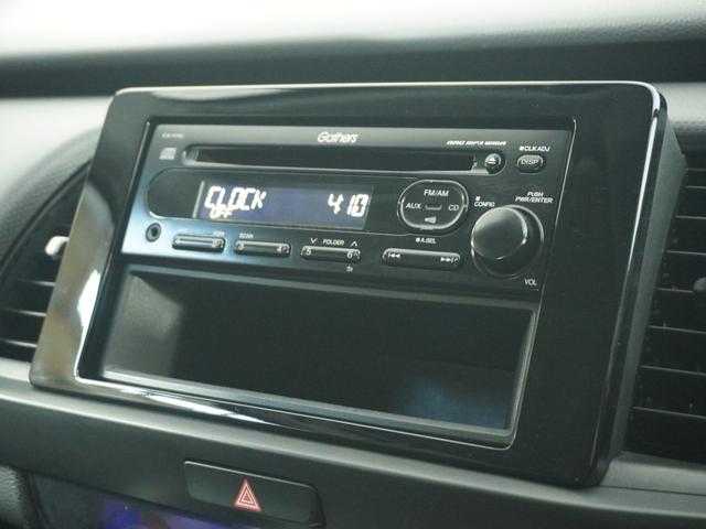 フィット ベーシック 純正CDチューナー/ETC車載器/スマートキー/盗難防止装置/横滑り制御装置/両席SRSエアバッグ/ABS/電動格納式ドアミラー/チップアップシート/パワーウインドウ/サイド&サイドカーテンエアバッグ(21枚目)