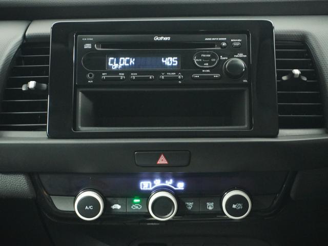 フィット ベーシック 純正CDチューナー/ETC車載器/スマートキー/盗難防止装置/横滑り制御装置/両席SRSエアバッグ/ABS/電動格納式ドアミラー/チップアップシート/パワーウインドウ/サイド&サイドカーテンエアバッグ(31枚目)