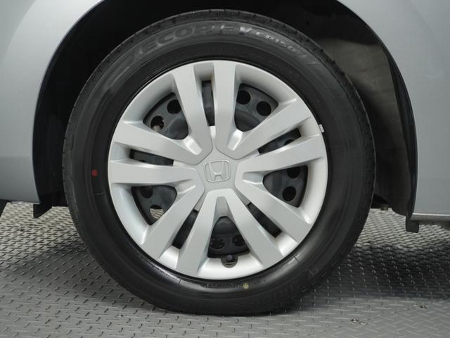 フィット ベーシック 純正CDチューナー/ETC車載器/スマートキー/盗難防止装置/横滑り制御装置/両席SRSエアバッグ/ABS/電動格納式ドアミラー/チップアップシート/パワーウインドウ/サイド&サイドカーテンエアバッグ(41枚目)