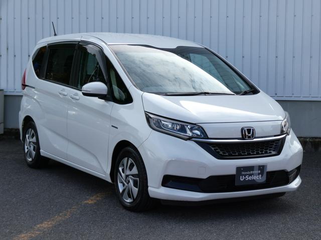 フリードハイブリッド ハイブリッド・Ｇホンダセンシング　純正ナビ・バックカメラ・ドラレコ・ＥＴＣ付　軽減ブレーキ　キーフリーシステム　１オ－ナ－　ＤＶＤ再生可能　サイドカーテンエアバック　ＥＣＯＮ　禁煙　後カメラ　Ａクルーズ　地デジフルセグＴＶ　シートＨ（14枚目）