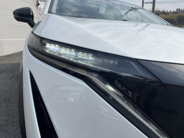 アリア Ｂ６　ｅ－４ＯＲＣＥ　パノラミックサンルーフ　プロパイロット　ニッサンコネクトナビ　　革巻きステアリング　　アダプティブＬＥＤヘッドランプ　パワーシート　インテリジェントアラウンドビューモニター　グレー木目調インパネ（60枚目）