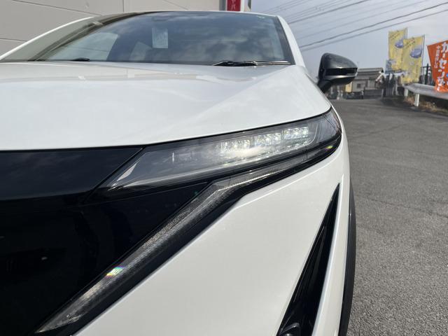 アリア Ｂ６　ｅ－４ＯＲＣＥ　パノラミックサンルーフ　プロパイロット　ニッサンコネクトナビ　　革巻きステアリング　　アダプティブＬＥＤヘッドランプ　パワーシート　インテリジェントアラウンドビューモニター　グレー木目調インパネ（62枚目）