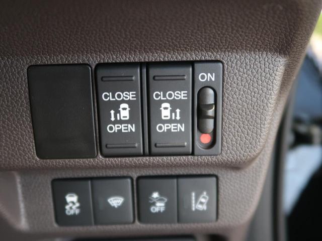 ハイブリッドG・ホンダセンシング 禁煙車 Cパッケージ 純正フルセグナビ 両側電動スライドドア バックカメラ ビルトインETC 前席シートヒーター コンフォートビューPKG 後席ロールサンシェード LEDヘッドランプ(7枚目)