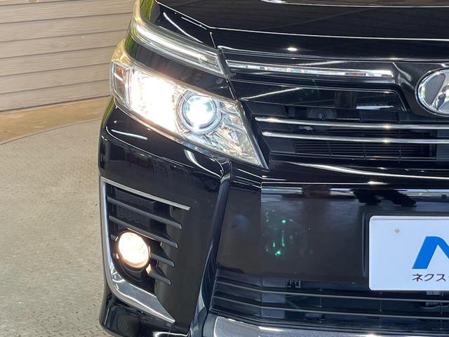 ヴォクシー ＺＳ　煌　純正９型ナビ　フリップダウン　両側電動ドア　ＬＥＤヘッド　ＥＴＣ　禁煙車　純正１６ＡＷ　リアオートエアコン　ドアバイザー　アイドリングストップ　横滑り防止　Ｂｌｕｅｔｏｏｔｈ　ＣＤ　スマートキー（13枚目）