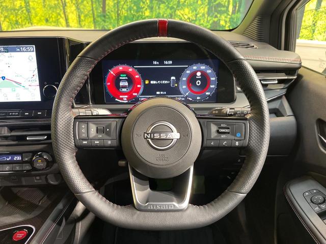 オーラ ニスモ　純正９型ナビ　全周囲カメラ　禁煙車　デジタルインナーミラー　ハーフレザーシート　コーナーセンサー　スマートキー　ＬＥＤヘッド　ＥＴＣ２．０　ドライブレコーダー　プロパイロット　ニスモエアロ（9枚目）