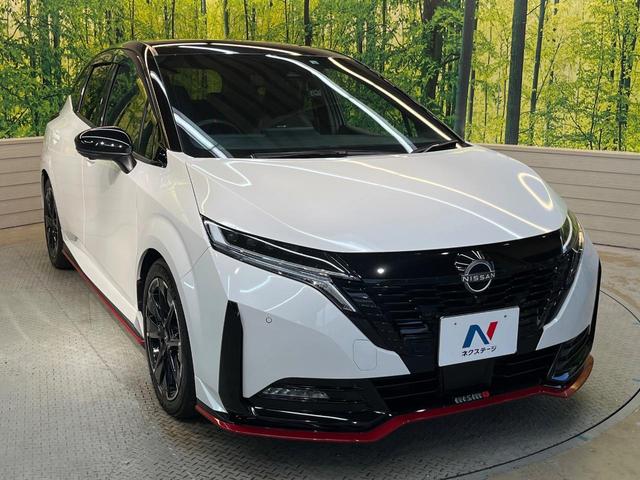 オーラ ニスモ　純正９型ナビ　全周囲カメラ　禁煙車　デジタルインナーミラー　ハーフレザーシート　コーナーセンサー　スマートキー　ＬＥＤヘッド　ＥＴＣ２．０　ドライブレコーダー　プロパイロット　ニスモエアロ（17枚目）