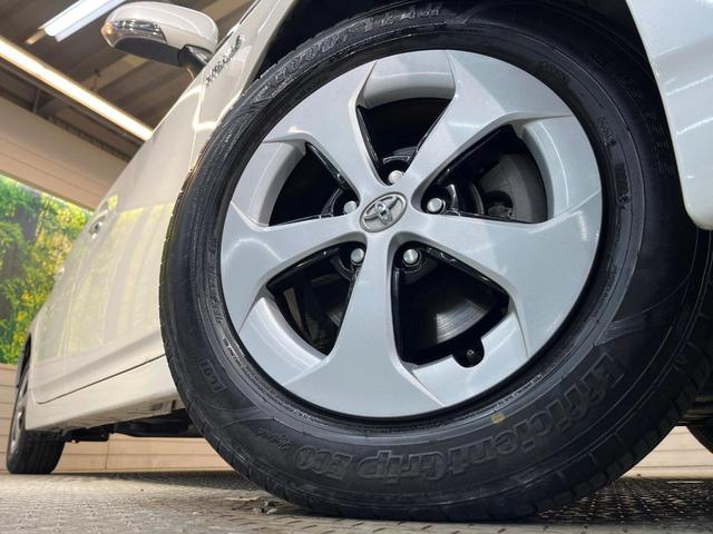 プリウス S 純正ナビ バックカメラ 禁煙車 HIDヘッド ETC スマートキー オートライト オートエアコン 純正15インチAW Bluetooth CD/DVD 革巻きステアリング ステアリングスイッチ(13枚目)