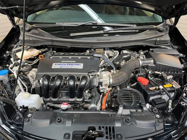 ジェイド ハイブリッドＲＳ・ホンダセンシング　ホンダセンシング　純正９型ナビ　バックカメラ　アダプティブクルーズ　ＥＴＣ　ＬＥＤヘッド　純正革巻きステリング　ステリングスイッチ　スマートキー　純正１８ＡＷ　ワンオーナー（18枚目）