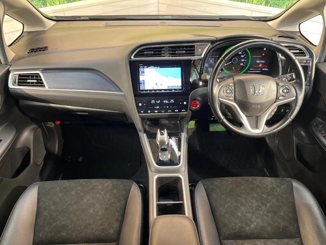 シャトル ハイブリッドX ホンダセンシング 純正8インチナビ バックカメラ シートヒーター レーダークルーズ ホンダセンシング ハーフレザー ETC LEDヘッド ドラレコ 横滑り防止 Bluetooth オートエアコン スマートキー(2枚目)