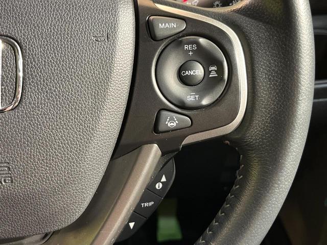 フリード+ハイブリッド ハイブリッドEX 純正ナビ バックカメラ 衝突軽減ブレーキ レーダークルーズコントロール 両側電動スライドドア 前席シートヒーター オートライト オートエアコン 純正15インチアルミホイール ロールサンシェード(5枚目)