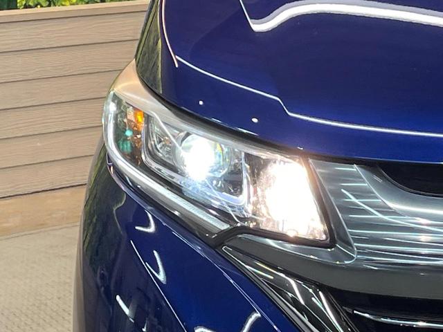 フリード+ハイブリッド ハイブリッドEX 純正ナビ バックカメラ 衝突軽減ブレーキ レーダークルーズコントロール 両側電動スライドドア 前席シートヒーター オートライト オートエアコン 純正15インチアルミホイール ロールサンシェード(13枚目)