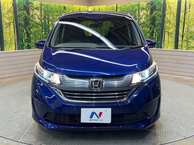 フリード+ハイブリッド ハイブリッドEX 純正ナビ バックカメラ 衝突軽減ブレーキ レーダークルーズコントロール 両側電動スライドドア 前席シートヒーター オートライト オートエアコン 純正15インチアルミホイール ロールサンシェード(15枚目)