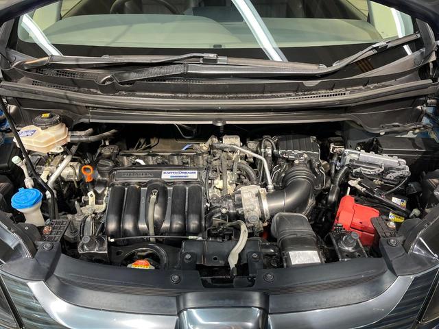 フリード+ハイブリッド ハイブリッドEX 純正ナビ バックカメラ 衝突軽減ブレーキ レーダークルーズコントロール 両側電動スライドドア 前席シートヒーター オートライト オートエアコン 純正15インチアルミホイール ロールサンシェード(18枚目)