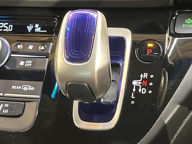 フリード+ハイブリッド ハイブリッドEX 純正ナビ バックカメラ 衝突軽減ブレーキ レーダークルーズコントロール 両側電動スライドドア 前席シートヒーター オートライト オートエアコン 純正15インチアルミホイール ロールサンシェード(21枚目)