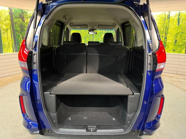 フリード+ハイブリッド ハイブリッドEX 純正ナビ バックカメラ 衝突軽減ブレーキ レーダークルーズコントロール 両側電動スライドドア 前席シートヒーター オートライト オートエアコン 純正15インチアルミホイール ロールサンシェード(55枚目)