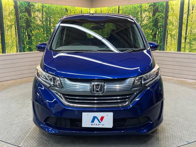 フリード+ハイブリッド ハイブリッドEX 純正ナビ バックカメラ 衝突軽減ブレーキ レーダークルーズコントロール 両側電動スライドドア 前席シートヒーター オートライト オートエアコン 純正15インチアルミホイール ロールサンシェード(56枚目)