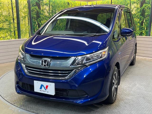 フリード+ハイブリッド ハイブリッドEX 純正ナビ バックカメラ 衝突軽減ブレーキ レーダークルーズコントロール 両側電動スライドドア 前席シートヒーター オートライト オートエアコン 純正15インチアルミホイール ロールサンシェード(57枚目)