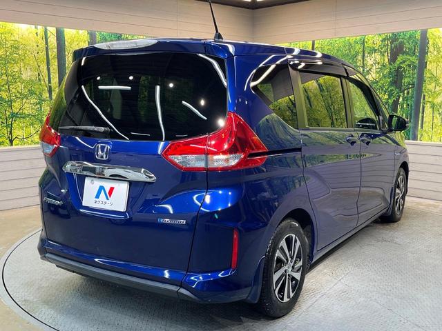 フリード+ハイブリッド ハイブリッドEX 純正ナビ バックカメラ 衝突軽減ブレーキ レーダークルーズコントロール 両側電動スライドドア 前席シートヒーター オートライト オートエアコン 純正15インチアルミホイール ロールサンシェード(61枚目)