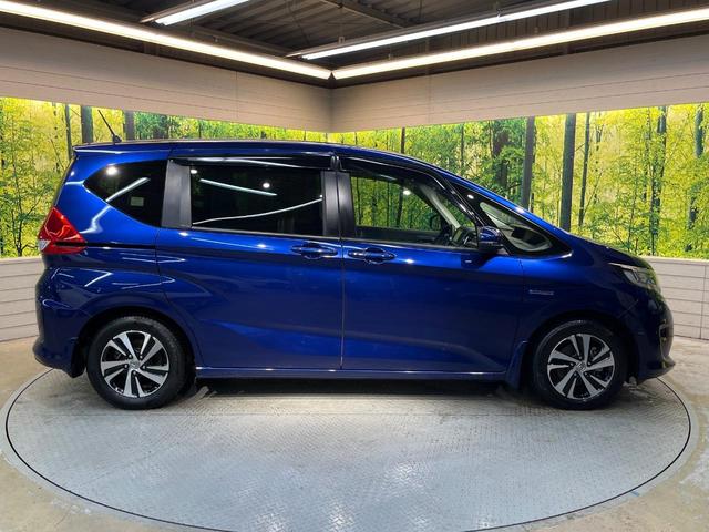 フリード+ハイブリッド ハイブリッドEX 純正ナビ バックカメラ 衝突軽減ブレーキ レーダークルーズコントロール 両側電動スライドドア 前席シートヒーター オートライト オートエアコン 純正15インチアルミホイール ロールサンシェード(62枚目)