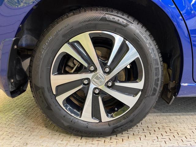 フリード+ハイブリッド ハイブリッドEX 純正ナビ バックカメラ 衝突軽減ブレーキ レーダークルーズコントロール 両側電動スライドドア 前席シートヒーター オートライト オートエアコン 純正15インチアルミホイール ロールサンシェード(64枚目)