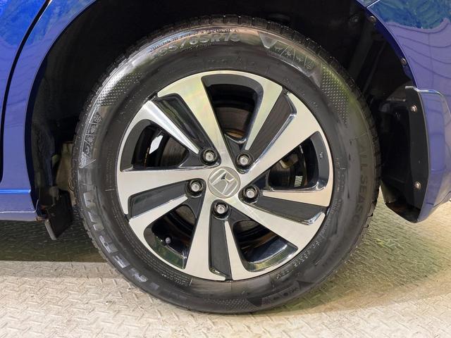 フリード+ハイブリッド ハイブリッドEX 純正ナビ バックカメラ 衝突軽減ブレーキ レーダークルーズコントロール 両側電動スライドドア 前席シートヒーター オートライト オートエアコン 純正15インチアルミホイール ロールサンシェード(65枚目)