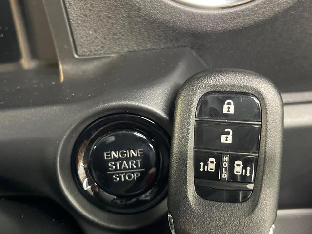 N-BOXカスタム ターボコーディネートスタイル 純正8型ナビ バックカメラ 両側電動ドア 衝突軽減ブレーキ シートヒーター LEDヘッド グレード専用15AW ETC車載器 アダプティブクルーズ 合皮レザーシート ブラックルーフ ワンオーナー 禁煙(35枚目)