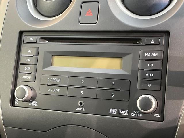 ノート Ｘ　禁煙車　スマートキー　ＥＴＣ　純正オーディオ　１４インチアルミホイール　アイドリングストップ　電動格納ミラー　ＣＤ再生　プッシュスタート　プライバシーガラス　黒内装（5枚目）