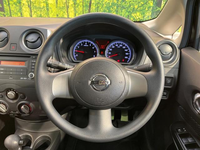 ノート Ｘ　禁煙車　スマートキー　ＥＴＣ　純正オーディオ　１４インチアルミホイール　アイドリングストップ　電動格納ミラー　ＣＤ再生　プッシュスタート　プライバシーガラス　黒内装（8枚目）