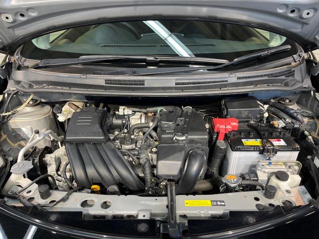 ノート Ｘ　禁煙車　スマートキー　ＥＴＣ　純正オーディオ　１４インチアルミホイール　アイドリングストップ　電動格納ミラー　ＣＤ再生　プッシュスタート　プライバシーガラス　黒内装（18枚目）