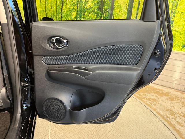 ノート Ｘ　禁煙車　スマートキー　ＥＴＣ　純正オーディオ　１４インチアルミホイール　アイドリングストップ　電動格納ミラー　ＣＤ再生　プッシュスタート　プライバシーガラス　黒内装（34枚目）