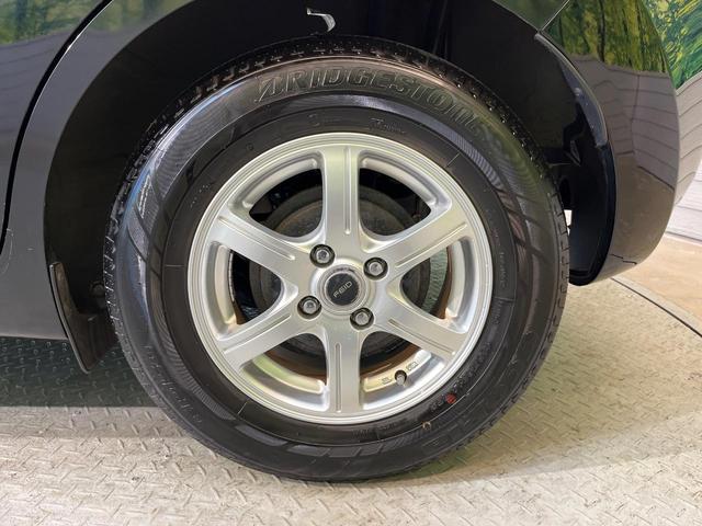 ノート Ｘ　禁煙車　スマートキー　ＥＴＣ　純正オーディオ　１４インチアルミホイール　アイドリングストップ　電動格納ミラー　ＣＤ再生　プッシュスタート　プライバシーガラス　黒内装（54枚目）