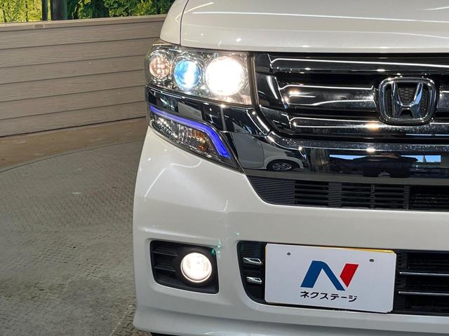 Ｎ－ＢＯＸカスタム Ｇ・Ｌパッケージ　４ＷＤ　衝突軽減ブレーキ　純正ディスプレイオーディオ　バックカメラ　電動ドア　シートヒーター　スマートキー　ＨＩＤヘッド　純正１４ＡＷ　ステリングスイッチ　オート電動格納ミラー　ワンオーナー　禁煙車（13枚目）