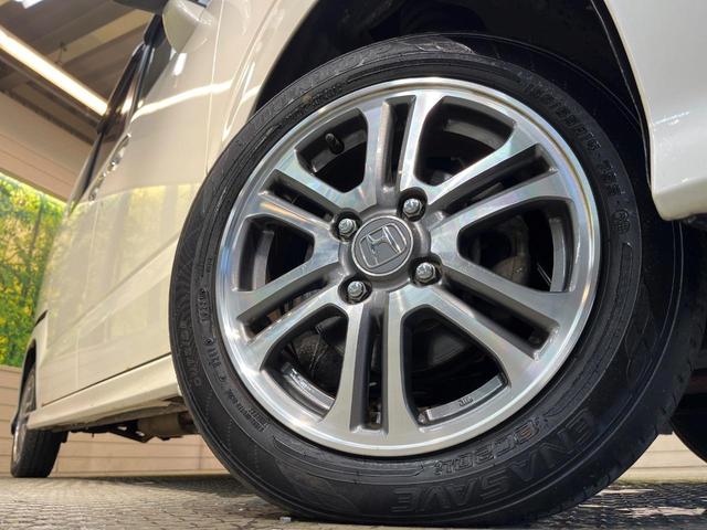 Ｎ－ＢＯＸカスタム Ｇ・Ｌパッケージ　４ＷＤ　衝突軽減ブレーキ　純正ディスプレイオーディオ　バックカメラ　電動ドア　シートヒーター　スマートキー　ＨＩＤヘッド　純正１４ＡＷ　ステリングスイッチ　オート電動格納ミラー　ワンオーナー　禁煙車（14枚目）