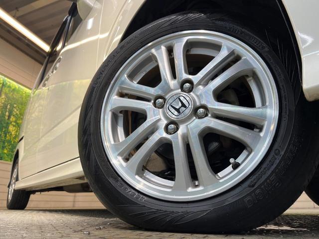 Ｎ－ＢＯＸカスタム Ｇ・Ｌパッケージ　ＳＤナビ　Ｂｌｕｅｔｏｏｔｈ　バックカメラ　電動ドア　ＥＴＣ車載器　横滑り防止装置　ＨＩＤヘッド　純正１４ＡＷ　ステリングスイッチ　スマートキー　アイドリングストップ　ワンオーナー　禁煙車（13枚目）