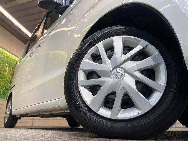 N-BOX L ホンダセンシング 純正ナビ バックカメラ ドラレコ ETC車載器 電動ドア アダプティブクルーズ シートヒーター リアセンサー LEDヘッド 車線逸脱警報 オートハイビーム ワンオーナー 禁煙車(14枚目)