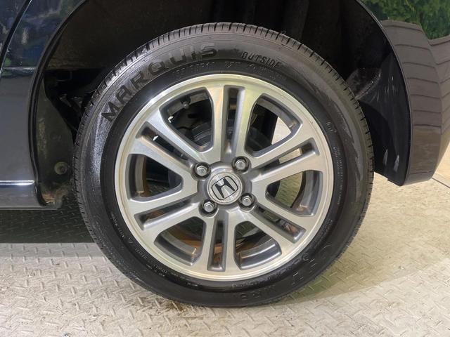 N-BOX G SSパッケージ ナビ 両側電動ドア Bluetooth スマートキー ETC車載器 オートエアコン 純正革巻きステリング ブラックインテリア 純正14AW アイドリングストップ 横滑り防止装置 ワンオーナー 禁煙車(54枚目)