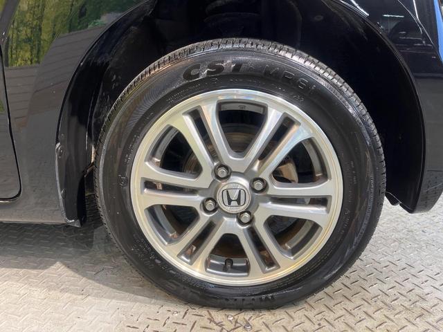 N-BOX G SSパッケージ ナビ 両側電動ドア Bluetooth スマートキー ETC車載器 オートエアコン 純正革巻きステリング ブラックインテリア 純正14AW アイドリングストップ 横滑り防止装置 ワンオーナー 禁煙車(56枚目)