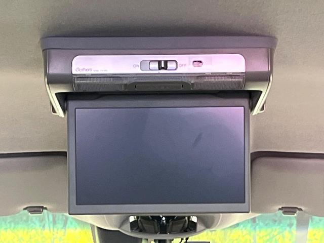 フリードハイブリッド ハイブリッド・EX ホンダセンシング メーカーナビ フリップダウン バックカメラ 両側電動ドア アダプティブクルーズ シートヒーター ハーフレザーシート LEDヘッド 純正15アルミ ドラレコ ETC 禁煙車(3枚目)