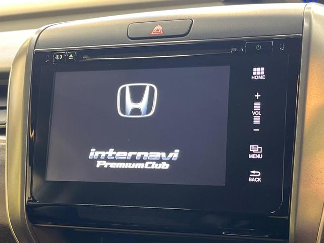 フリードハイブリッド ハイブリッド・EX ホンダセンシング メーカーナビ フリップダウン バックカメラ 両側電動ドア アダプティブクルーズ シートヒーター ハーフレザーシート LEDヘッド 純正15アルミ ドラレコ ETC 禁煙車(4枚目)
