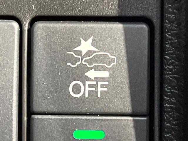 ヴェゼル ハイブリッドＸ・ホンダセンシング　ホンダセンシング　純正８型ナビ　バックカメラ　アダプティブクルーズ　タッチパネル式オートエアコン　ＥＴＣ　革巻きステリング　ＬＥＤヘッド　純正１６アルミ　ステアリングスイッチ　車線逸脱警報　禁煙車（3枚目）