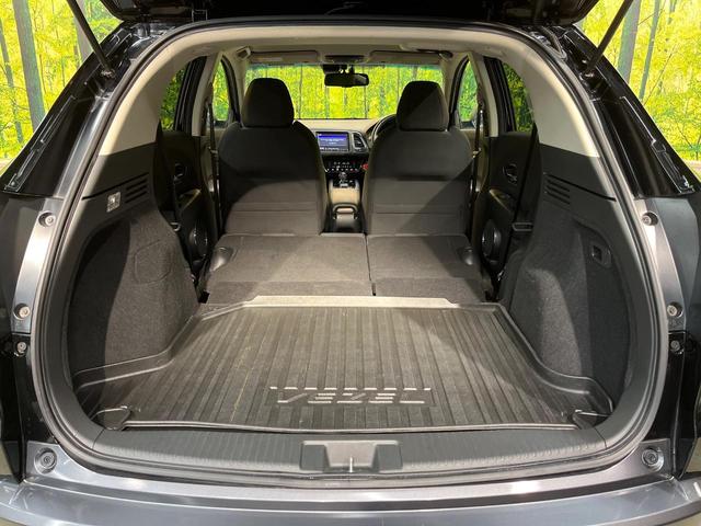 ヴェゼル ハイブリッドＸ・ホンダセンシング　ホンダセンシング　純正８型ナビ　バックカメラ　アダプティブクルーズ　タッチパネル式オートエアコン　ＥＴＣ　革巻きステリング　ＬＥＤヘッド　純正１６アルミ　ステアリングスイッチ　車線逸脱警報　禁煙車（12枚目）