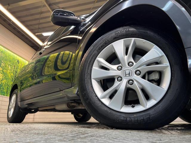 ヴェゼル ハイブリッドＸ・ホンダセンシング　ホンダセンシング　純正８型ナビ　バックカメラ　アダプティブクルーズ　タッチパネル式オートエアコン　ＥＴＣ　革巻きステリング　ＬＥＤヘッド　純正１６アルミ　ステアリングスイッチ　車線逸脱警報　禁煙車（14枚目）