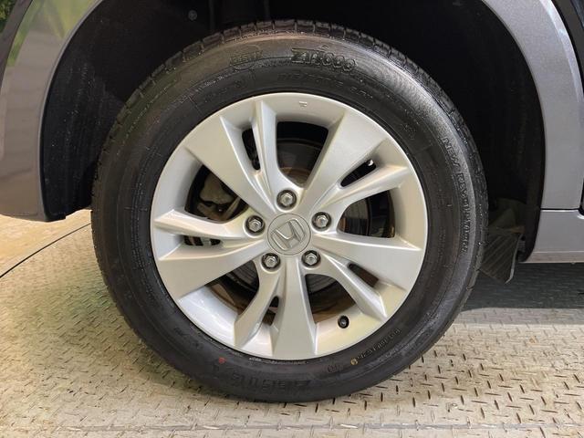 ヴェゼル ハイブリッドＸ・ホンダセンシング　ホンダセンシング　純正８型ナビ　バックカメラ　アダプティブクルーズ　タッチパネル式オートエアコン　ＥＴＣ　革巻きステリング　ＬＥＤヘッド　純正１６アルミ　ステアリングスイッチ　車線逸脱警報　禁煙車（61枚目）