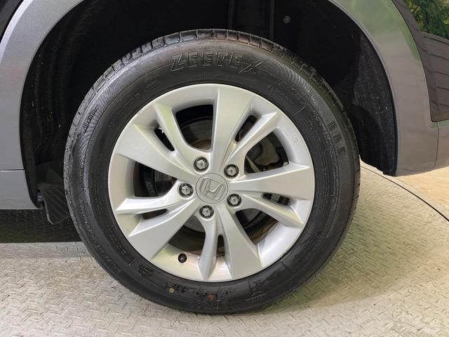 ヴェゼル ハイブリッドＸ・ホンダセンシング　ホンダセンシング　純正８型ナビ　バックカメラ　アダプティブクルーズ　タッチパネル式オートエアコン　ＥＴＣ　革巻きステリング　ＬＥＤヘッド　純正１６アルミ　ステアリングスイッチ　車線逸脱警報　禁煙車（62枚目）