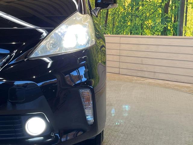 プリウスアルファ Ｓ　チューン　ブラック　純正ナビ　Ｂｌｕｅｔｏｏｔｈ　オプションＬＥＤヘッド　ＥＴＣ車載器　オートエアコン　オートライト　革巻きステリング　メッキドアハンドル　ブラックインテリア　純正１６アルミ　禁煙車（12枚目）